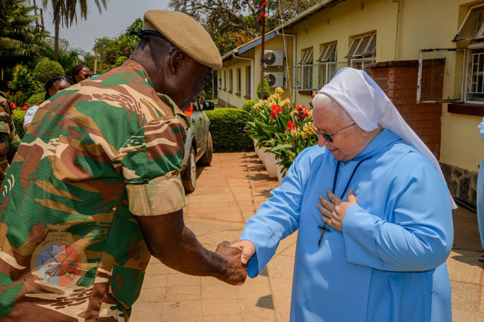 The Commandant greeting Sister Mariola